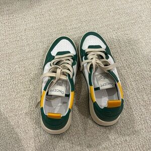 Green and white leather Oncept sneakers. Size 7.